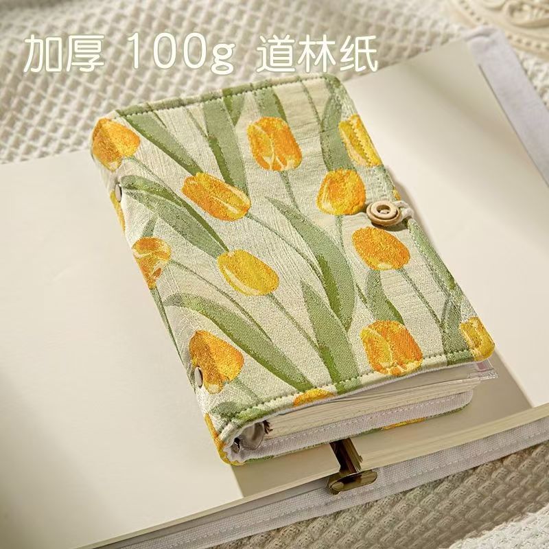Loose-leaf notebook with fabric cover and 90 blank inner pages